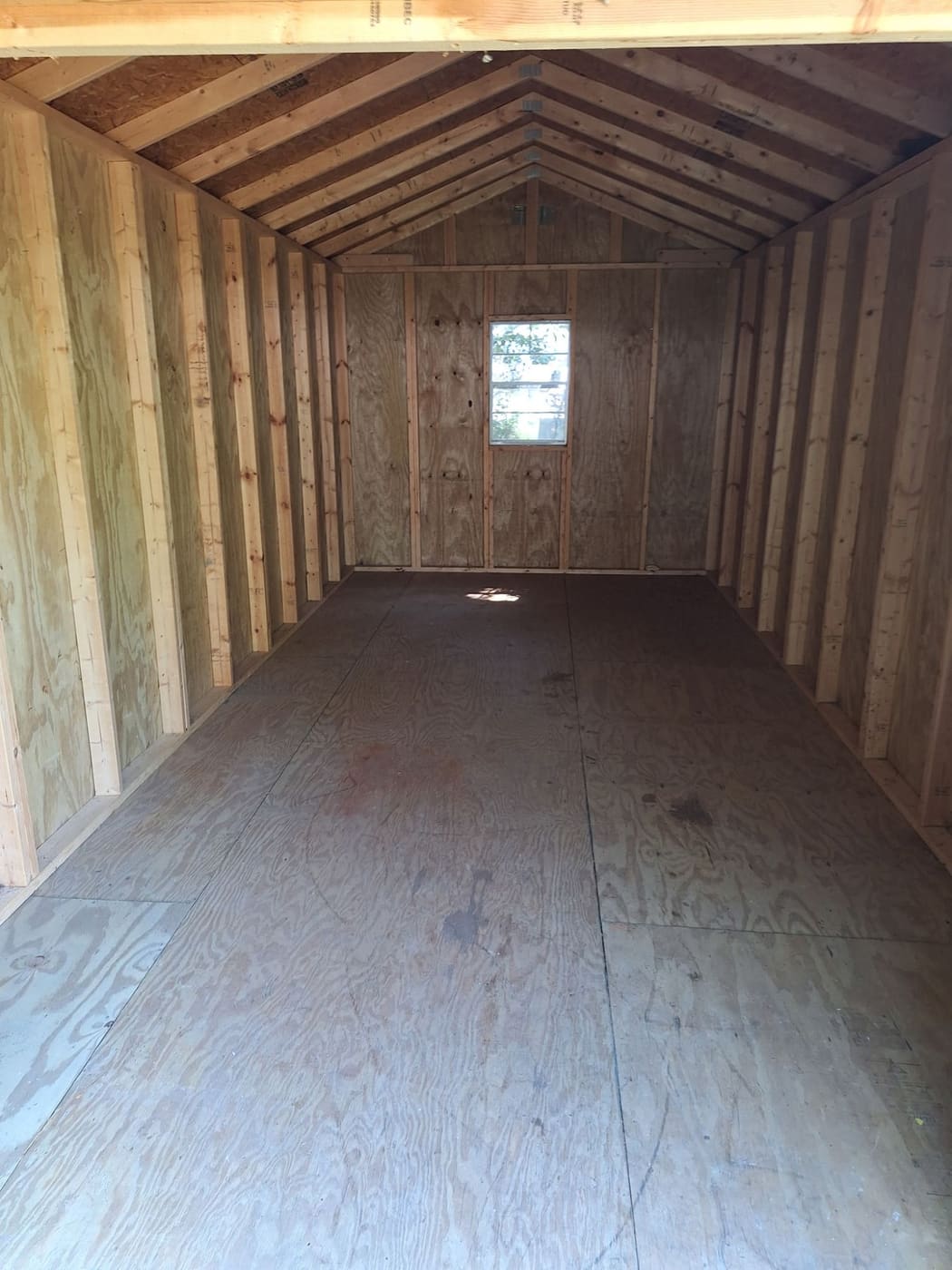 The same shed completely emptied and swept after cleanout